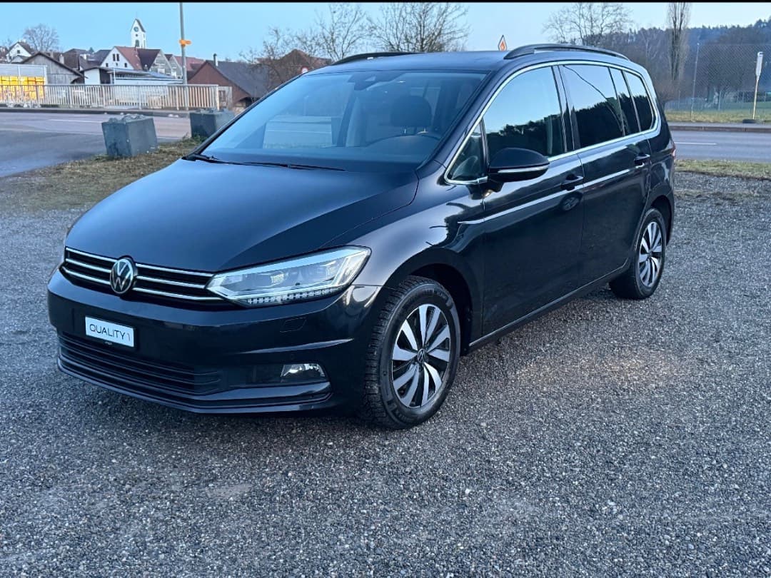 Volkswagen Touran — 1/2